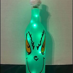 Whimsical LED Grinch Bottle Decor